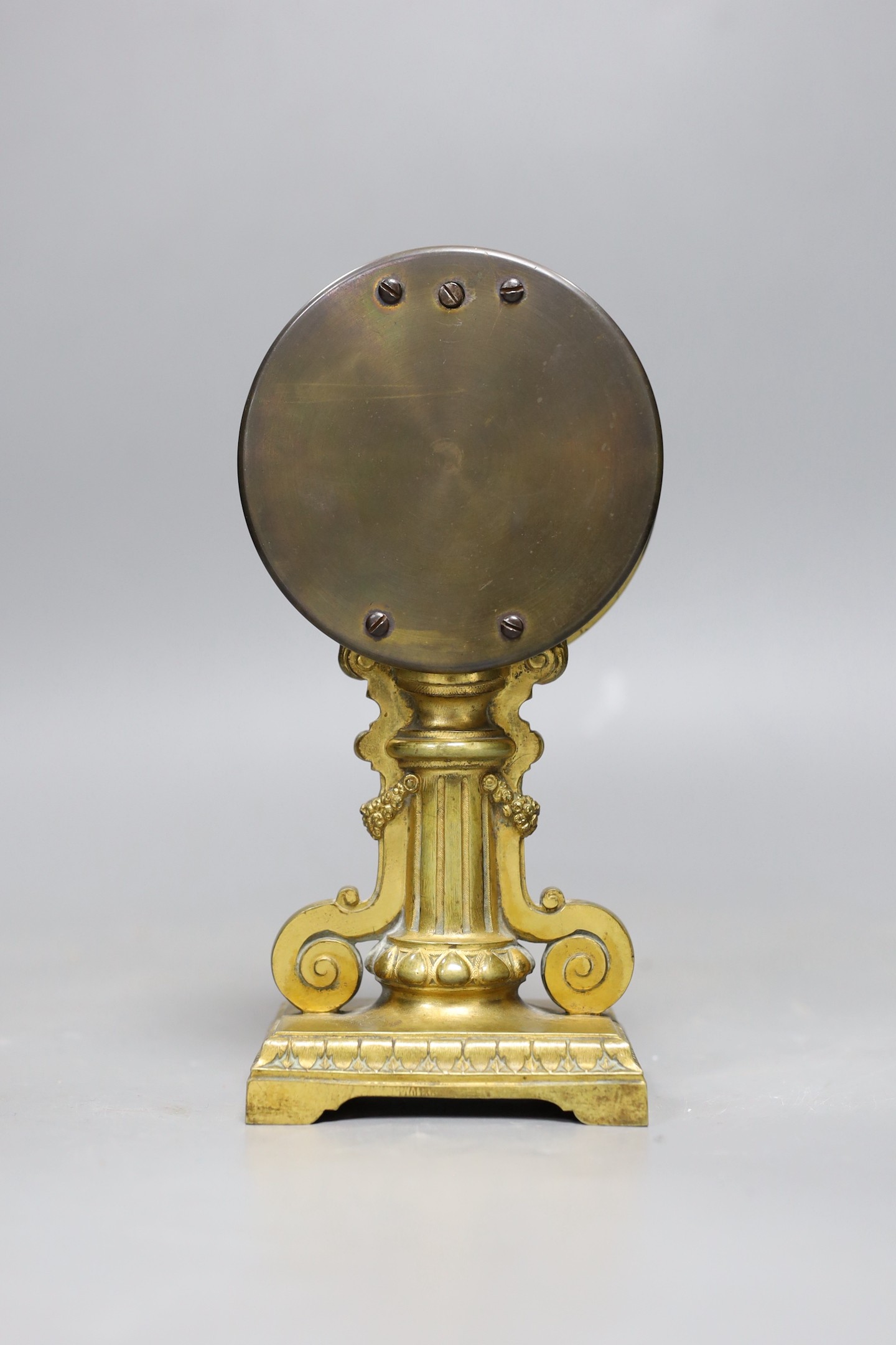 A gilt metal aneroid barometer classical design, 19cms high